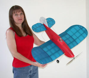 Supermodel Melanie Blattenberger holding the newly completed Great Planes Lil Poke - Airplanes and Rockets