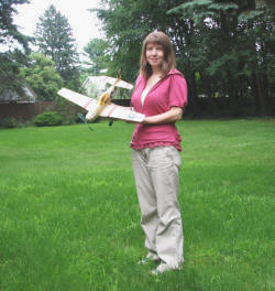 Supermodel Melanie holding the Guillows P-51 Mustang - Airplanes and Rockets
