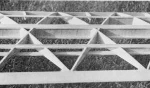 Detail shot of the wing structure shows spar webbing and warren truss ribs - Airplanes and Rockets
