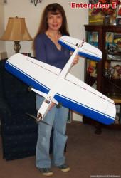 Supermodel Melanie holding BJM Enterprise-E Control Line Airplane (bottom) - Airplanes and Rockets