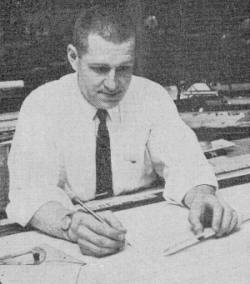 Seymour Glassner has a mighty serious look on his face when he's behind his drafting board  - Airplanes and Rockets