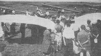 Moscow gliding enthusiasts examining waving wings of Letatlin - Airplanes and Rockets