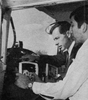 Flight Instructor John Merriman checks instrument settings - Airplanes and Rockets