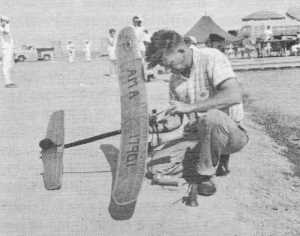 John C. Allen prepares his seaplane for flight in the ROW event - Airplanes and Rockets