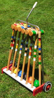 Left-front view of restored South Bend 6-player croquet set - Airplanes and Rockets