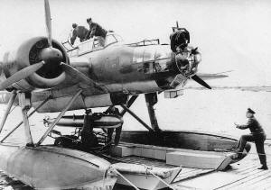 Ju 88 loading a torpedo - Airplanes and Rockets