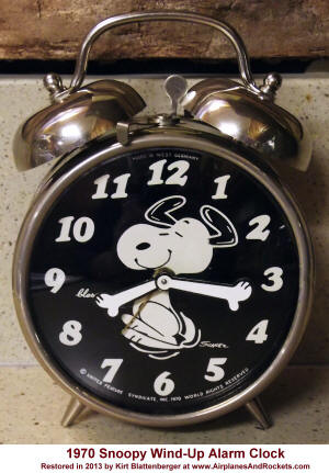 Snoopy Wind-Up Alarm Clock (front) - Airplanes and Rockets