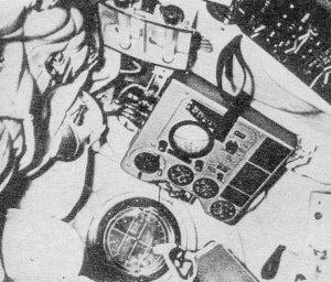 Interior of Voskhod 1 cabin shows viewport between the feet of the command pilot and simple instrument panel - Airplanes and Rockets