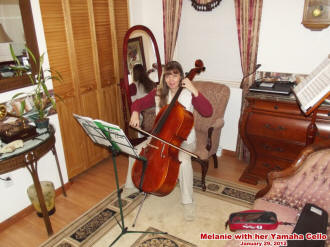 Supermodel Melanie Sitting in Her Queen Anne Style Chair Playing Cello - Airplanes and Rockets