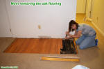 Supermodel Melanie removing oak flooring in new stairwell area - Airplanes and Rockets