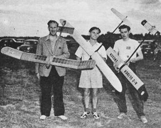 Rudolf Lindner (Germany) in center with his latest model - Airplanes and Rockets