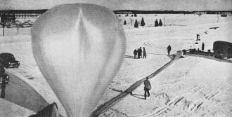 Helium is piped through thin, extruded-plastic tube to form 17-foot bubble - Airplanes and Rockets